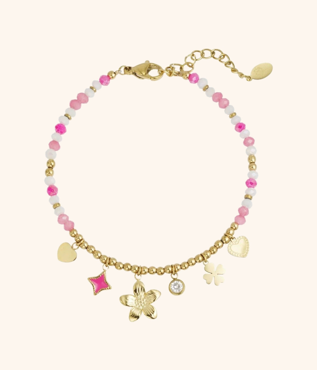 goldenes Armband mit rosafarbenen Steinen und Anhängern in verschiedenen Formen vor weißem Hintergrund