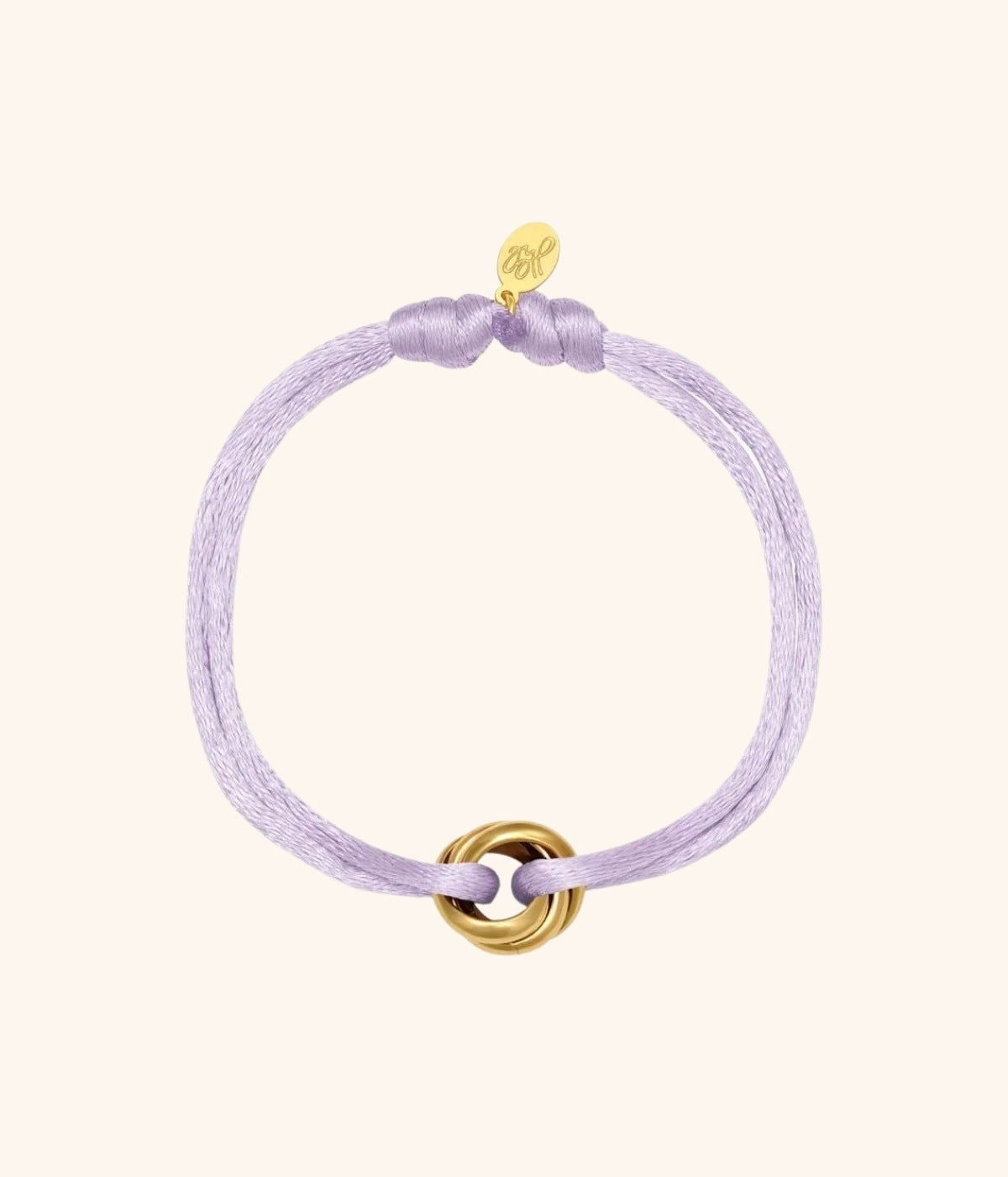 Violettes Satin Armband mit goldenem Knoten vor weißem Hintergrund