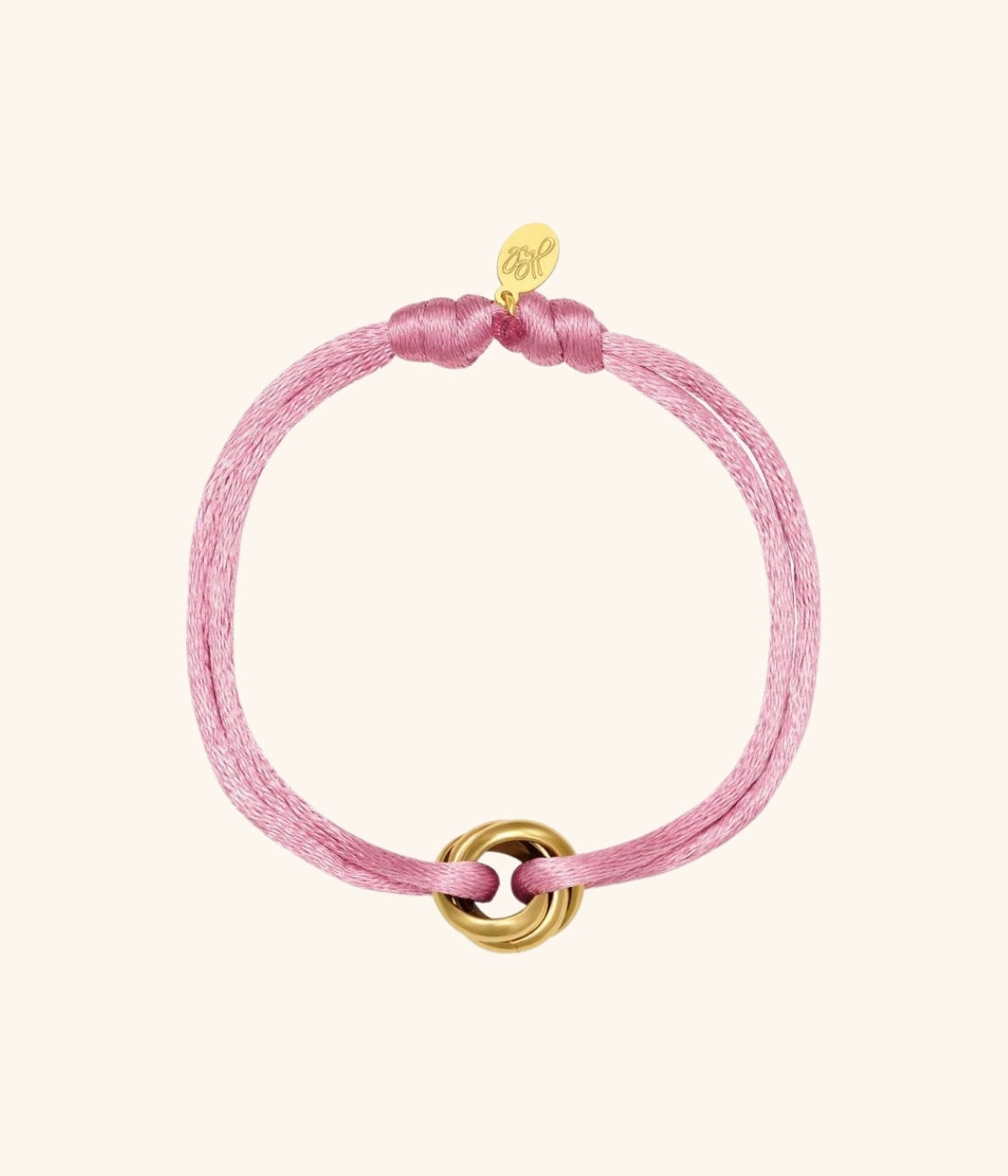 Rosa Satin Armband mit goldenem Knoten vor weißem Hintergrund