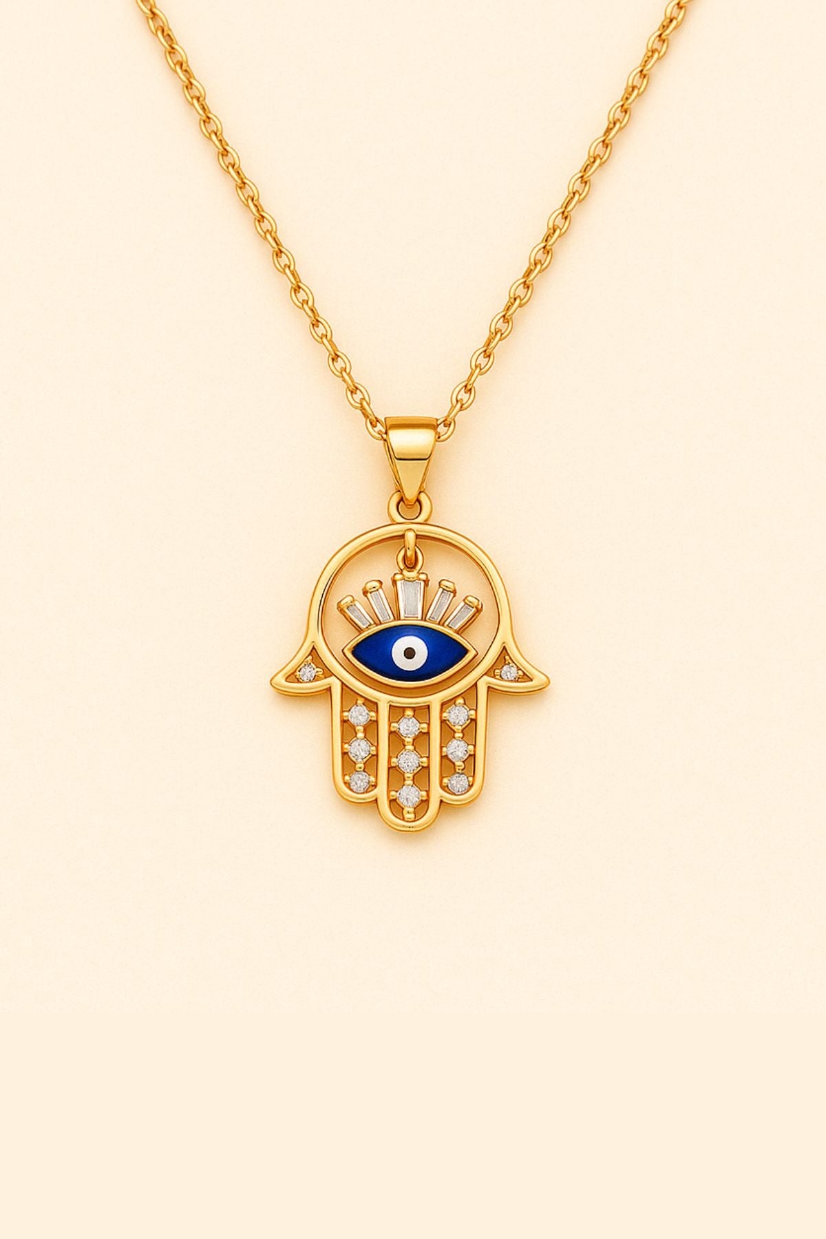 Goldene Kette mit blauem Auge in Hamsa Hand – Fatimas Hand als orientalisches Schutzsymbol