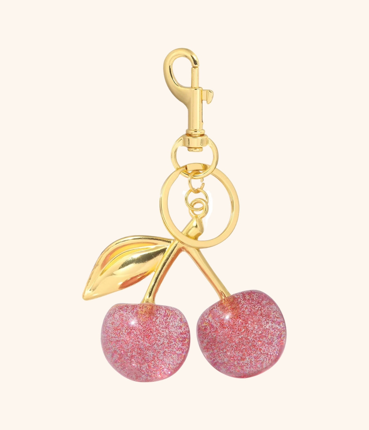 Taschenanhänger Kirsche in Gold mit rosa Glitzerkirschen – eleganter Schlüsselanhänger für Taschen