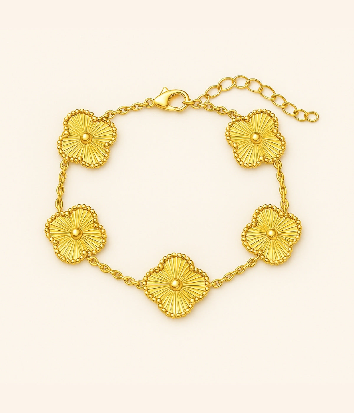 Vergoldetes Kleeblatt Armband mit goldenen Anhängern – edler Glücksbringer Schmuck