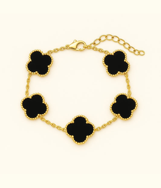 Vergoldetes Kleeblatt Armband mit schwarzen Anhängern – edler Glücksbringer Schmuck